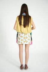 Short asymmetrical skirt  | Ecru w/ mustard flowers