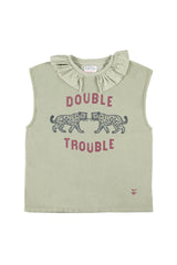 Sleeveless t-shirt w/ ruffled collar | Light green w/ "double trouble" print