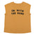 Sleeveless t-shirt w/ deep round neck . Brown w/ "i'm with the band" print